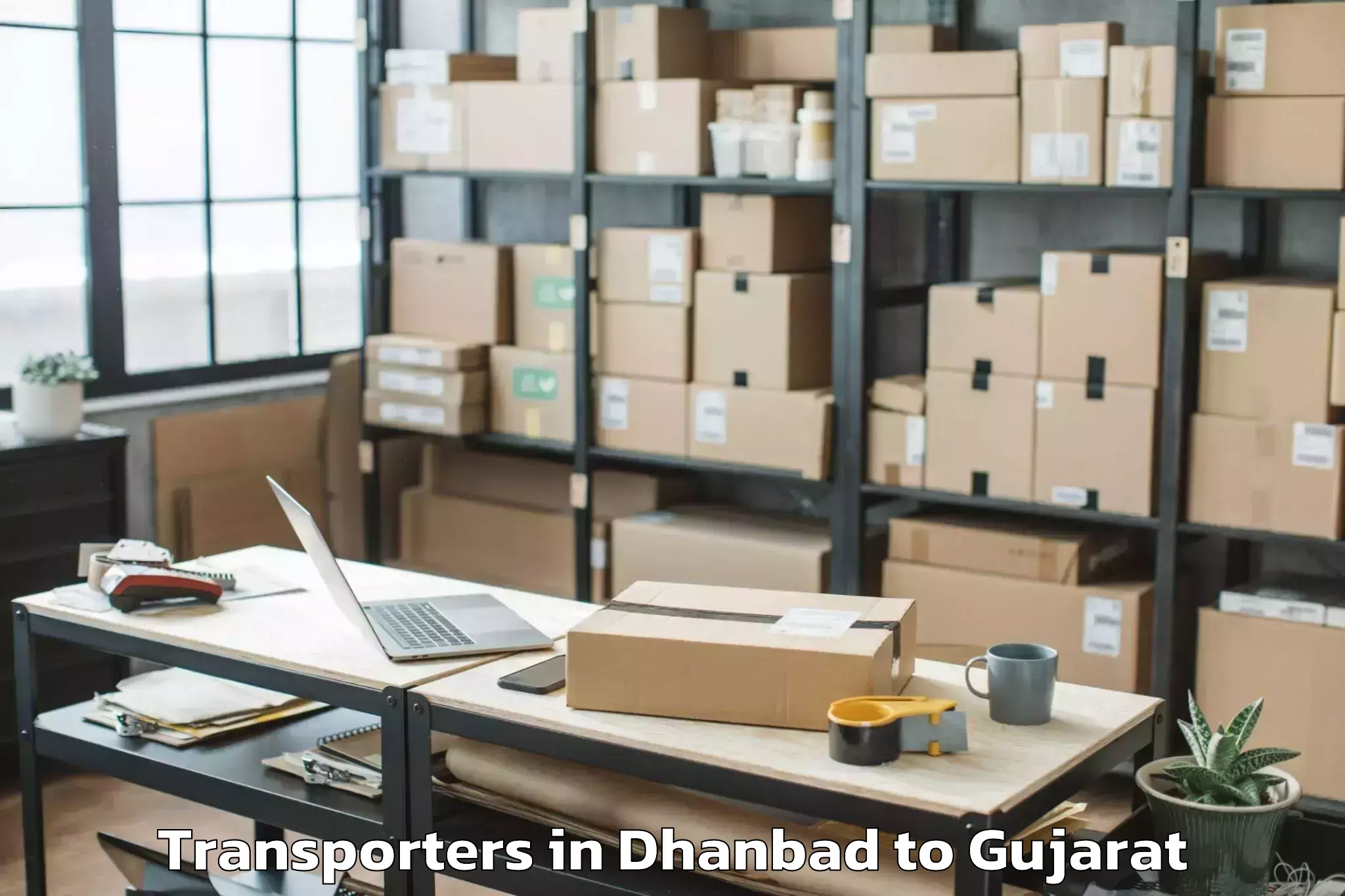 Leading Dhanbad to Gujarat University Of Transpla Transporters Provider